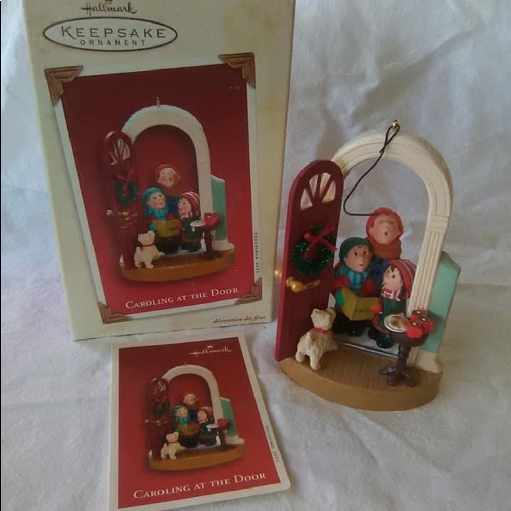Hallmark keepsake ornament Caroling  2003